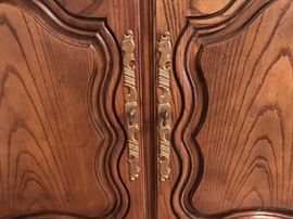 Hardware on beautifully hand carved Baker Furniture buffet 