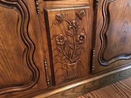 One of the hand carvings on the Baker Furniture buffet
