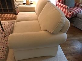 Custom built love seat by Prade, Inc. Features “box spring” construction and cushions made with foam wrapped in down material.