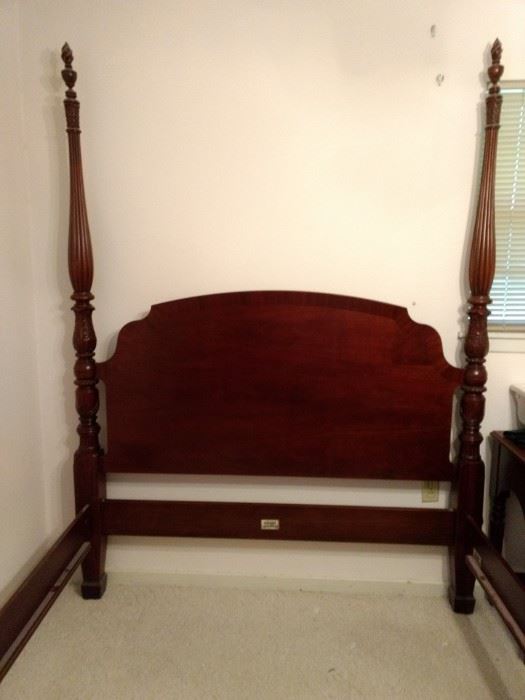 Ethan Allen 18th Century Mahogany. Queen size,  4 post bed model 22-5641 color 254. Original retail price of $3299. Carved and turned posts. Shaped banded headboard. In excellent condition. $1450