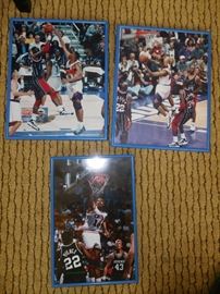 Many framed action photos with famous players