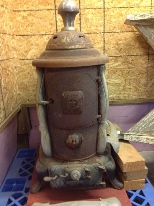 Working antique wood burning stove