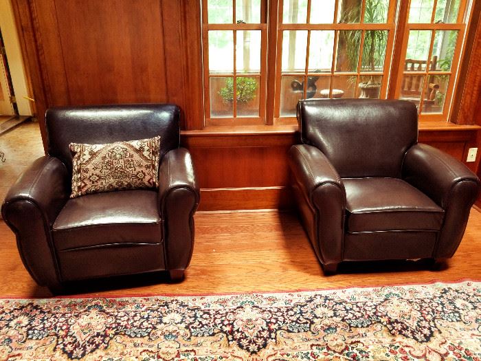 Pair of leather like chairs 