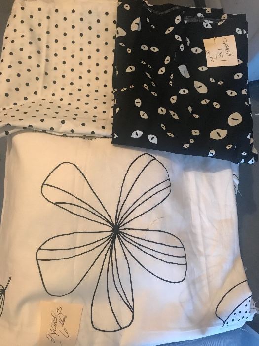 Multiple black and white cotton fabric.