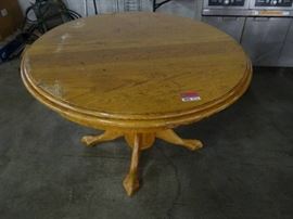 Round 48 Light Stained Wood Table With Pedestal B