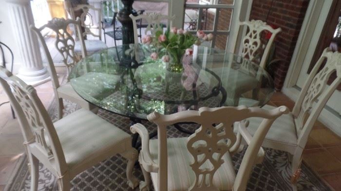 54" round table with six chairs, all $1,800