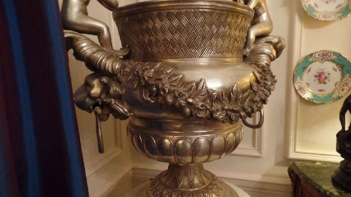 silver plated grand urn on marble pedestal,,$6,200