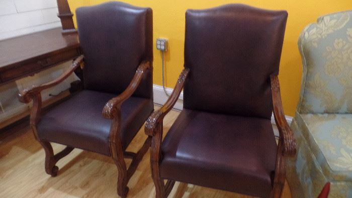 Pair leather  arm chairs  $800 pair
