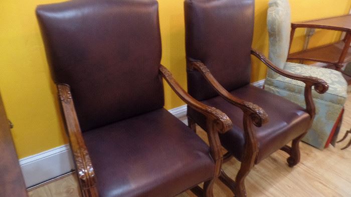 pair leather chairs