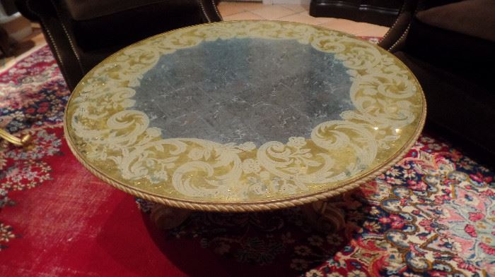 round silver and gold leaf coffee table $650
