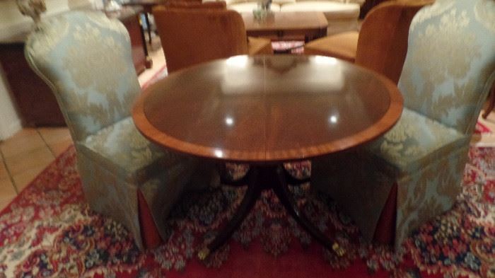 Round Baker approx 36" round table with two 18" leaves $800