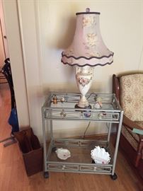 Bar cart, table lamp, Dresden figurine