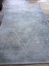 Chandra designer 100% wool hand tied rug in great condition. Design is a vintage grey and soft blue faded look. 5' x 7'-6"  $275