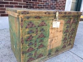 Beautiful old trunk with rusted metal accents and faded green patina. Great piece.  33"W x 18"D x 22"H $250