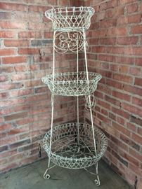 3 Tier Victorian wire metal planter with lots of fancy decorative scrollwork. 4'-8"H x 24"W base and 15"W top.  $350