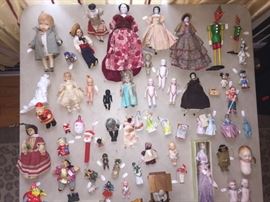 Great antique doll and toy collection. A variety with some porcelain, glass, wood, plastic and cloth materials. Pricing varies