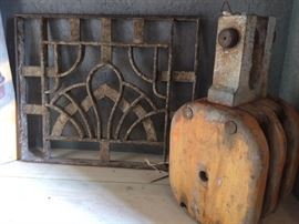 1920's art deco style iron vent cover and heavy duty old pulley.  $150 for vent cover, $85 for pulley