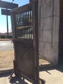 Old Wood barn door with metal bars, trim and sidebar. Comes with the mirror (which is optional to remove) 6'-10.25"H x 3'-4.5"W  $275