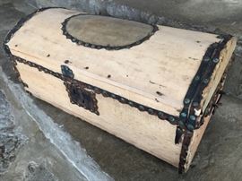 Small old travel trunk that used to be covered with leather in it's time.  22"W x 9.5"H x 11"D  $25