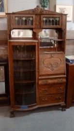 turn of the century American rift oak side by side with bowed glass front and stained glass top and mirrors