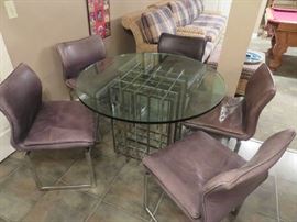 Vintage modern dinette set. Leather chairs by Pieff