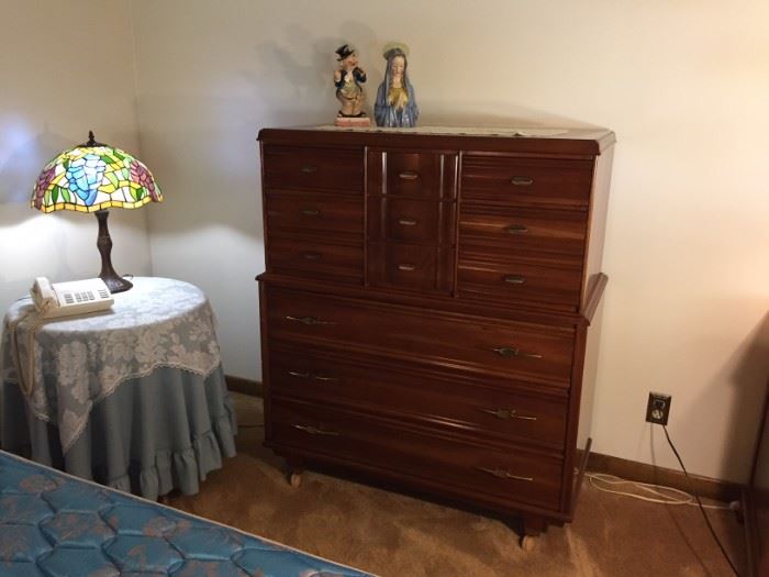 "Kling" solid cherry tall dresser on casters.  Dimensions 49" height x 40" width x 20" depth.  Excellent conditions.