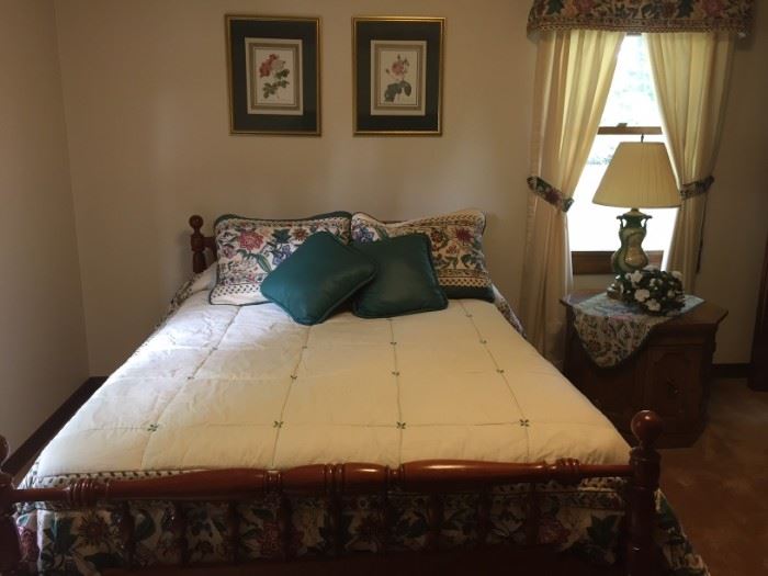 Solid cherry full-size bed frame.  Bedding also for sale. 
 Excellent condition.