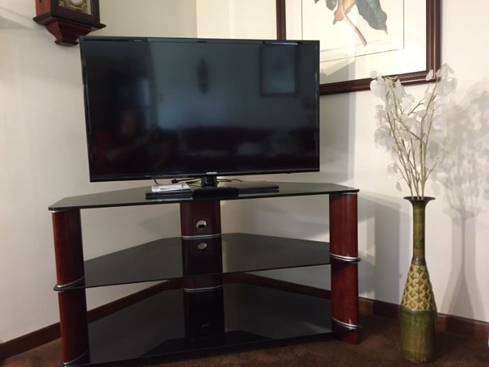 Smoked glass/wood TV stand.  Excellent condition.  Flat screen TV is NOT for sale