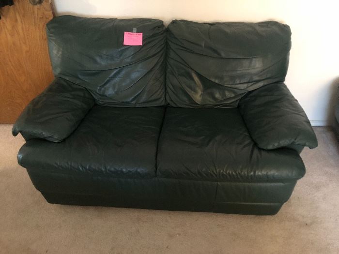 Green leather loveseat with ottoman