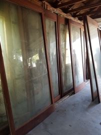 Set of EIGHT large vintage architectural windows...mahogany frames, 6 of them with CURVED GLASS!