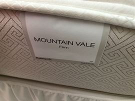 LIKE NEW POSTUREPEDIC KING MATTRESS AND BOX SPRING 