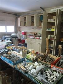Garage full of misc, including tools, yard items, much more