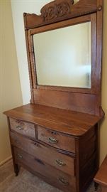 Antique dresser with swivel mirror