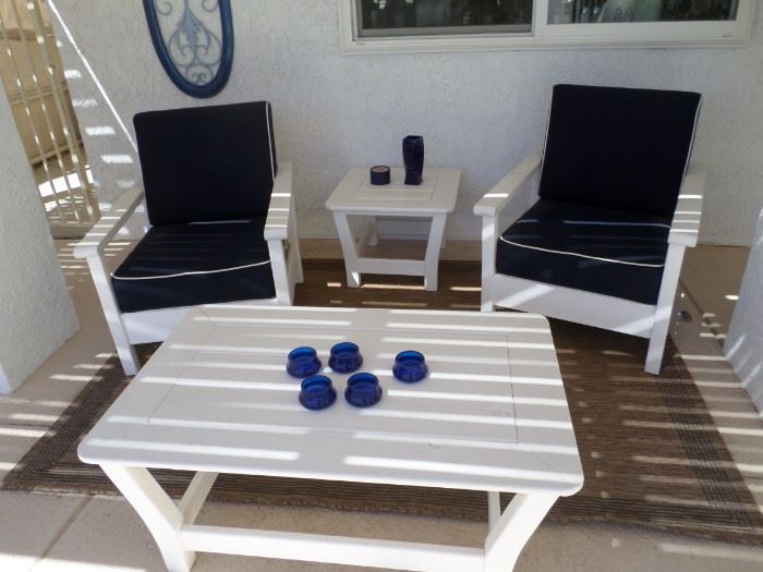 New White Furniture, New Pads in Navy with white Piping Set includes 2 chair, table & side table.  JUst purched for $ 1,800
