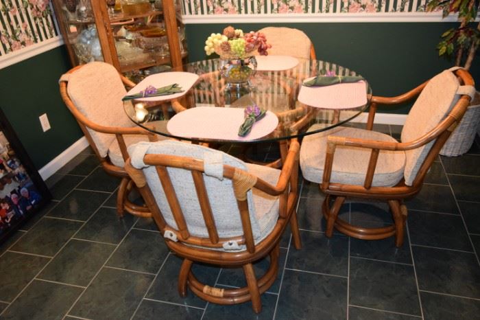 Rattan and 48" Round Glass Table with 4 Swivel Base Chairs