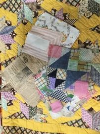 Quilt pieces, paper pattern on back dates from the 20’s to the 40’s