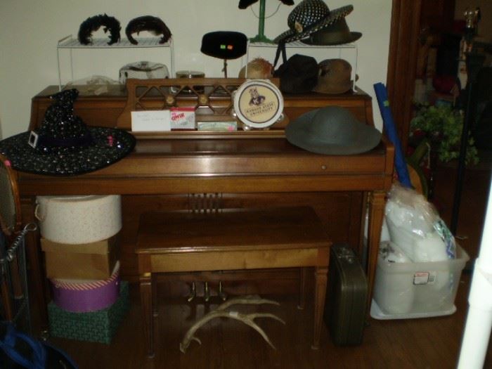 Wurlitzer Piano and hat collection