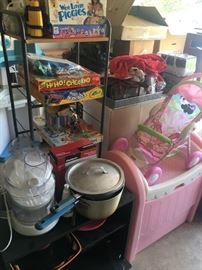 Assorted garage items, including games.