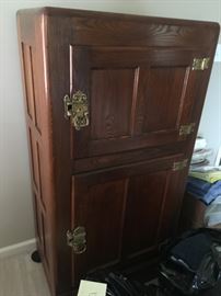 Antique ice box with solid brass hardware