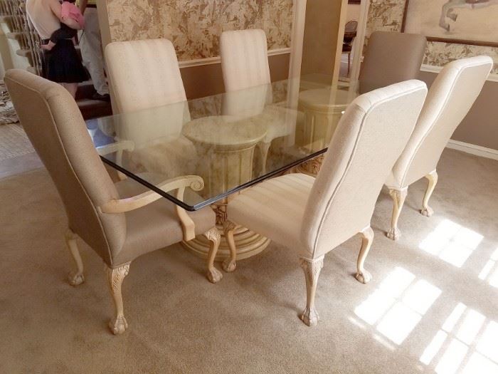 A must see glass dining room table with fabulous pedestal base! Purchased from LBrandys and (6) upholstered chairs! Table measures 4' x 8' and the pedestals are 18-1/2" diameter. Table - $200 and chairs - $50 each.