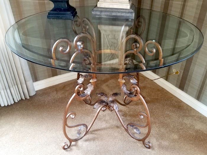 Gorgeous wrought iron and glass occasional table purchased from LBrandys. 42" diameter