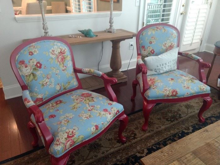 $100 each Red arm chairs with floral print 