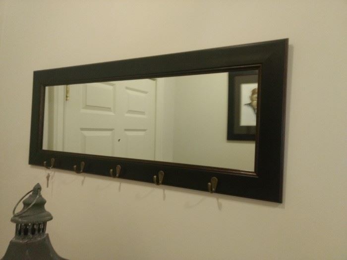 $20.00 Mirror with hooks  36x14"  