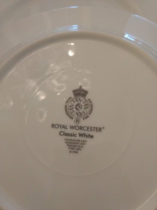  $12.00 4 small dinner plates white.  Royal Worcester