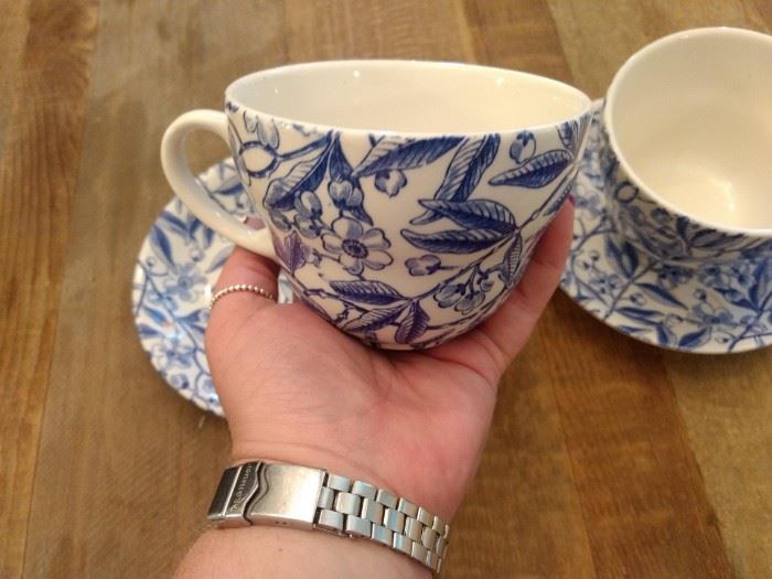  2 large blue and white tea cups with saucers.  Prunus by Berleigh 