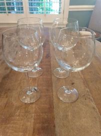 $10.00 each set. 2 sets of 4 large wine glasses. The Cellar. 
