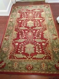 $100.00 Red Rug with tan and green accents-Woolmark-Franklin 5 X 8