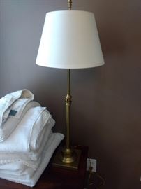 $25.00 Gold lamp with white shade.  Adjustable