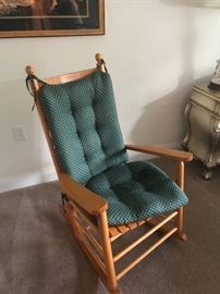wooden porch rocker with pillow