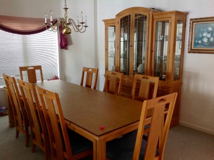 Dining Table with 8 Chairs & Table Pads, and a matching China Cabinet